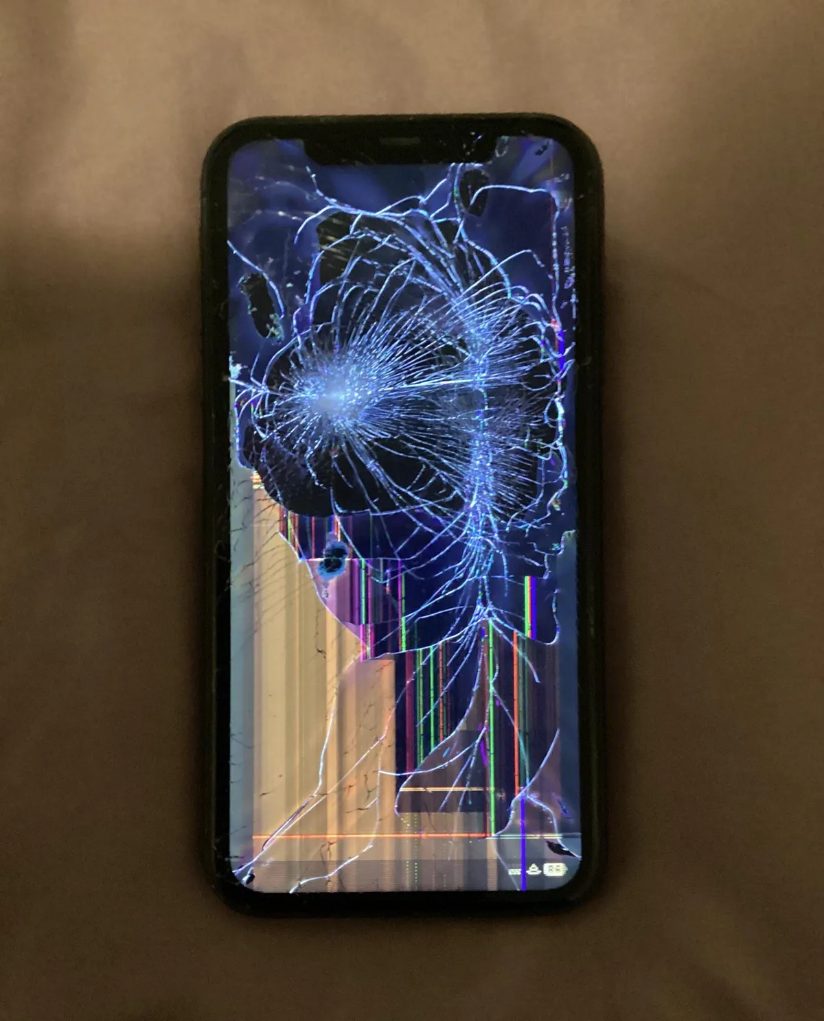 Broken Apple device screen repair service - cracked screen replacement for iPhone, iPad, MacBook, and all Apple devices